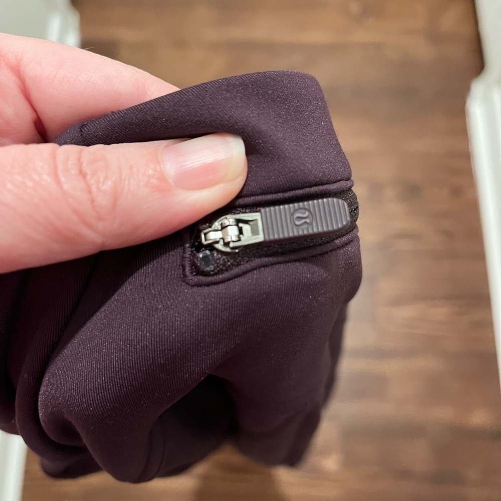 Lululemon Fast As Fleece Tight
Black Cherry Womens Size 4
Reflective Pocket - Picture 10 of 14
